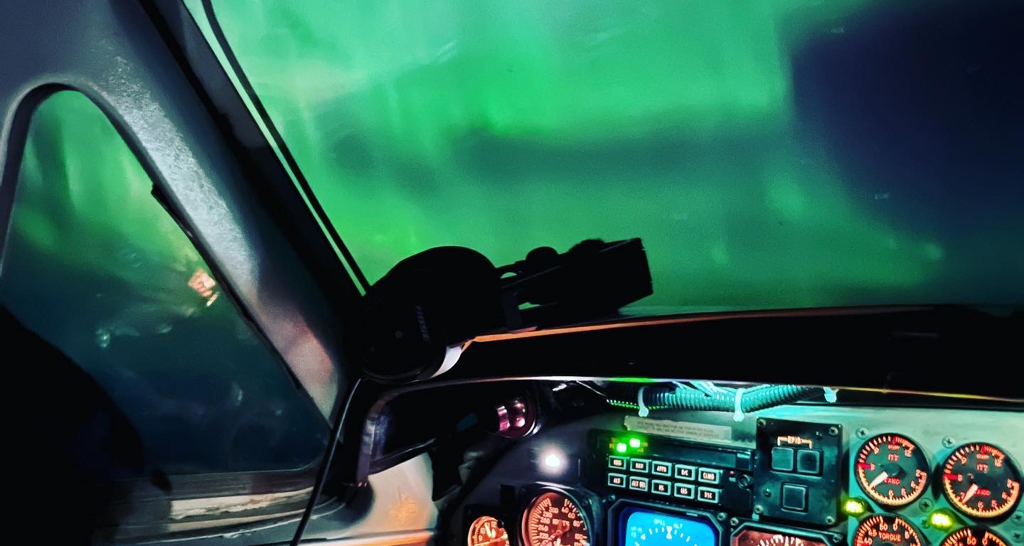 beech 900-d northern lights from cockpit