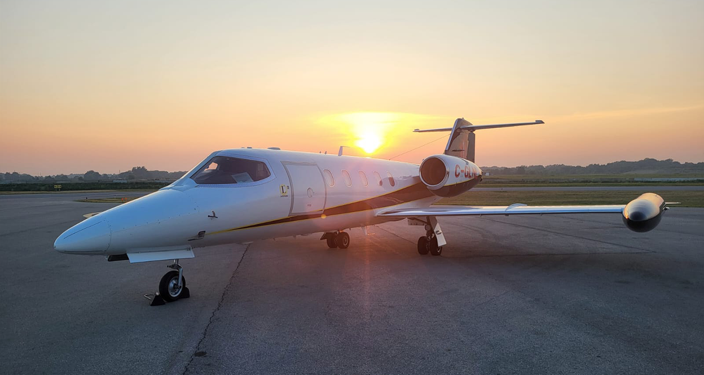 bombardier learjet on runway