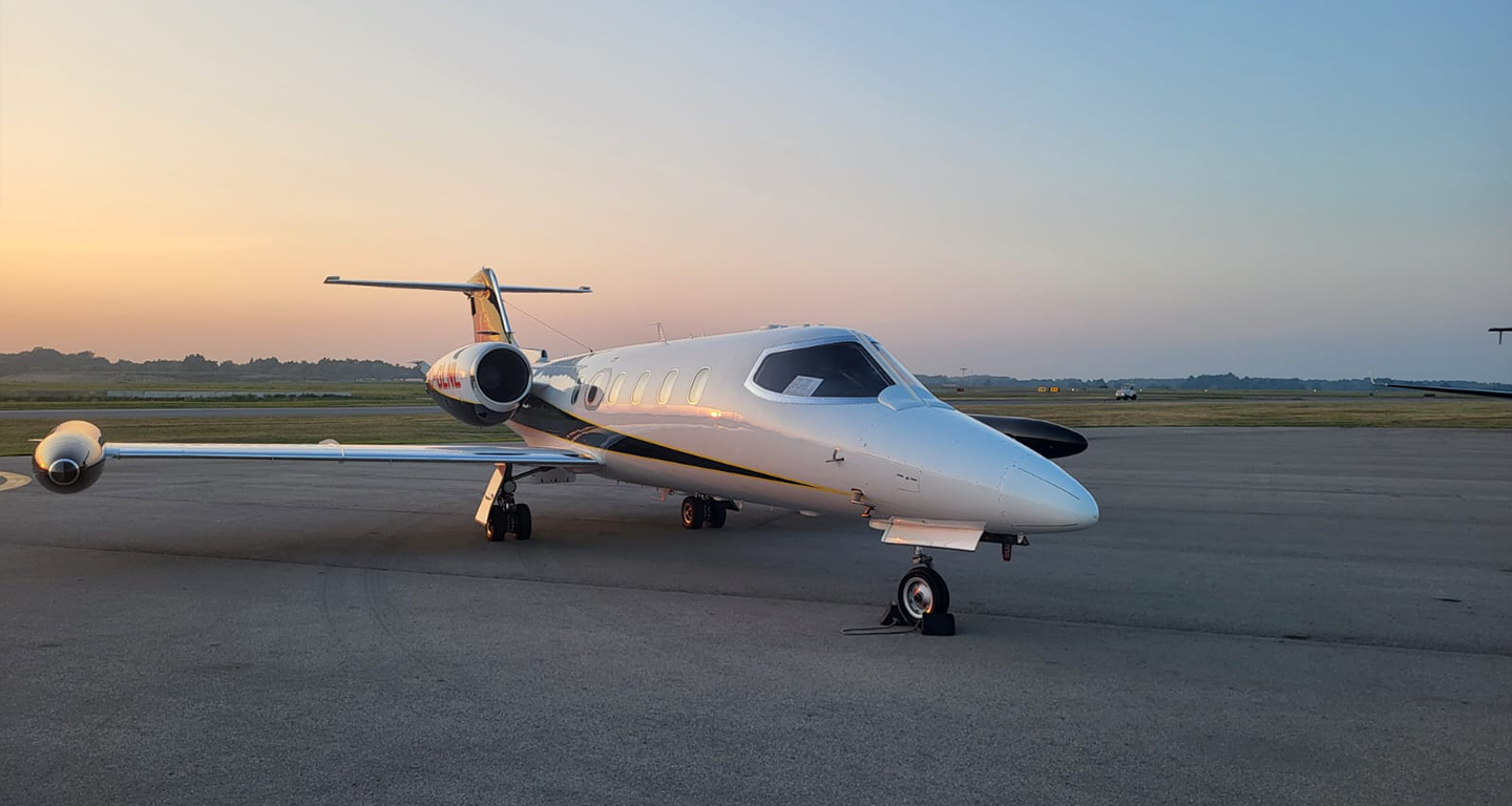 bombardier learjet on runway