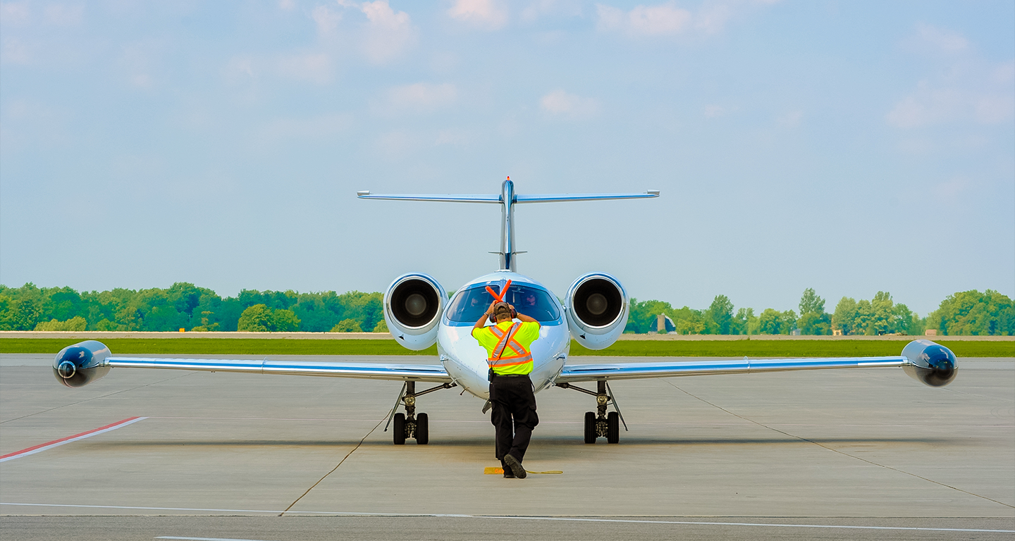 bombardier learjet on runway