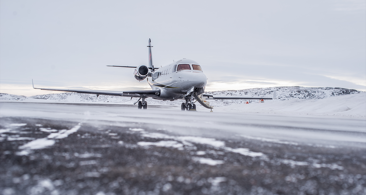 gulfstream jet on runway in winter
